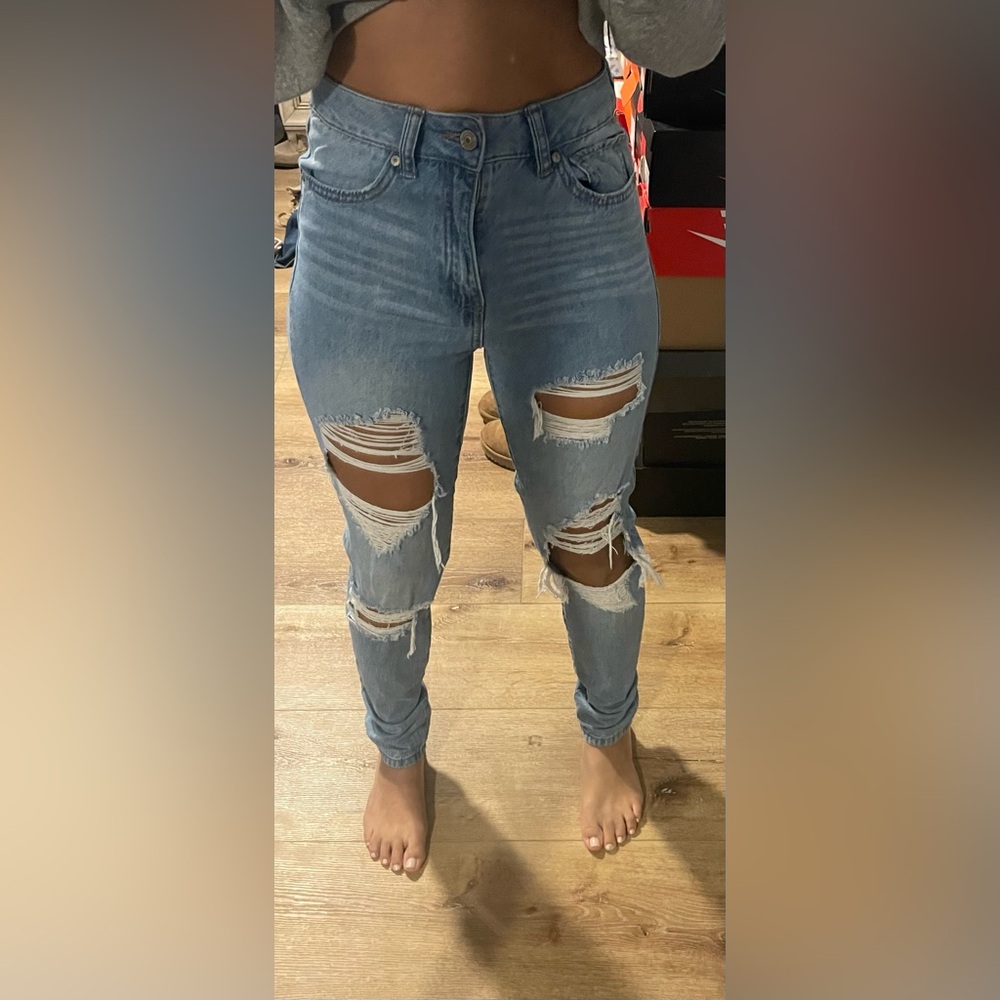 Barely worn high rise distressed Rewash brand Jeans